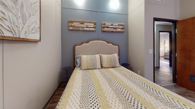 Bedroom featuring dark wood-style floors | Image 39