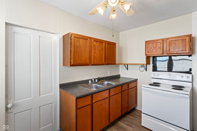 Upper Kitchen with new LVP flooring- all appliances will stay | Image 40