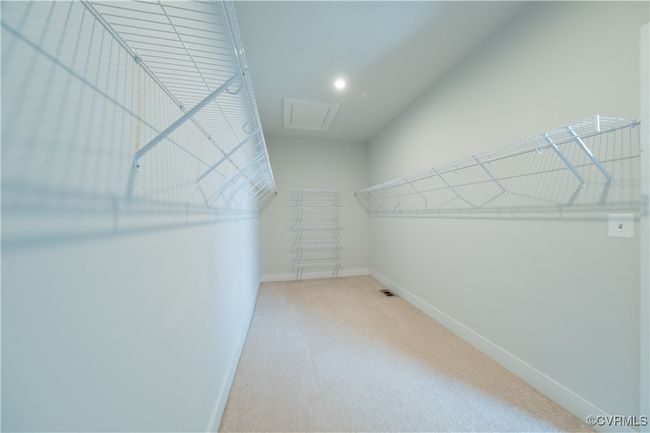 Spacious closet featuring carpet flooring | Image 40