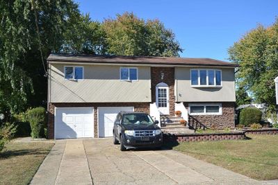 99 Andrew Avenue, House other with 4 bedrooms, 2 bathrooms and null parking in Islip Terrace NY | Image 1