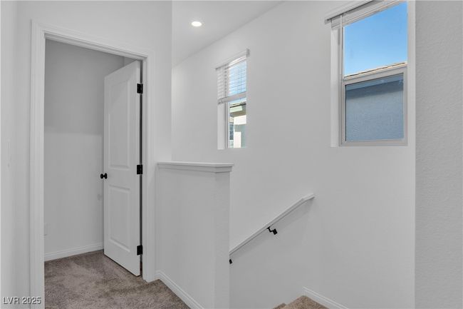 Stairs featuring baseboards, recessed lighting, and carpet | Image 21