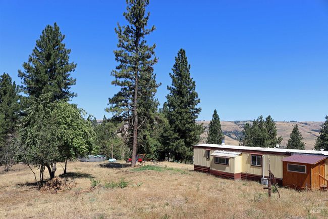 View of yard with a view of countryside | Image 24