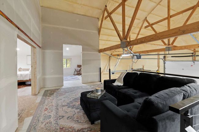 Living area with high vaulted ceiling | Image 26