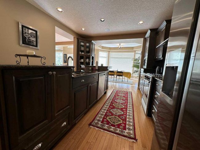 50 Hamptons Manor Nw, Home with 5 bedrooms, 3 bathrooms and 6 parking in Calgary AB | Image 12