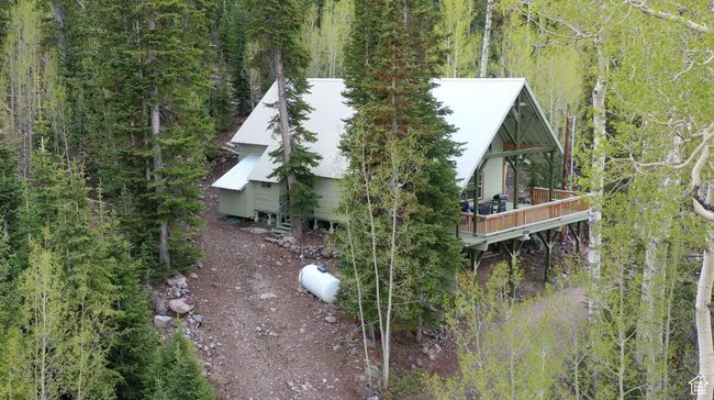 View of subject property featuring a heavily wooded area | Image 53