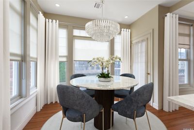 Imagine the possibilities! Virtually staged Elegant Dining Area. | Image 3