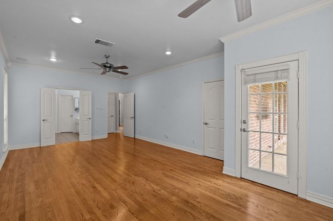 Large primary suite with direct egress to back patio | Image 16