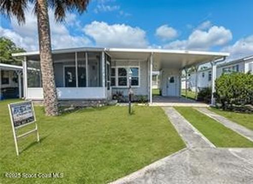 939 Laurel Cir, Barefoot Bay, FL, 32976-7298 | Card Image