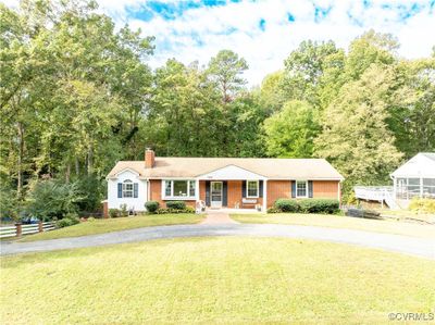 View of front facade featuring a front yard | Image 3