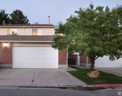 8331 S 1050 E, Townhouse with 5 bedrooms, 2 bathrooms and 2 parking in Sandy UT | Image 1