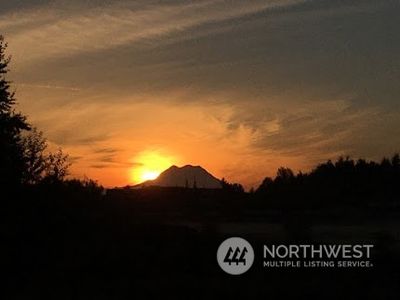 Sunrise and Sunsets with Mt. Rainier in view? It’s like nature’s daily masterpiece, with vibrant pinks and oranges lighting up the sky and the mountain standing majestic in the shadows. It’s hard not to feel a sense of calm wash over you—this view brings a refreshing start and end to each day. And if you're craving even more outdoor adventure, Millersylvania State Park is nearby, less than 10 minutes away. A perfect balance of natural beauty and proximity to everyday conveniences. | Image 2