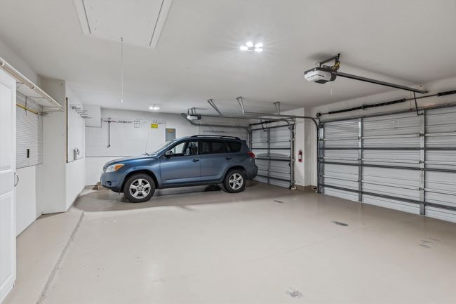 Huge full front facing 3 car garage... extra clean and extra storage! | Image 26