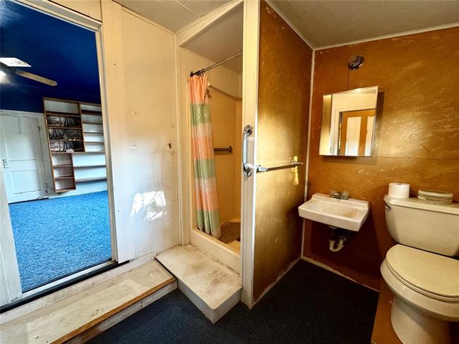 Full bathroom services primary bedroom. | Image 25