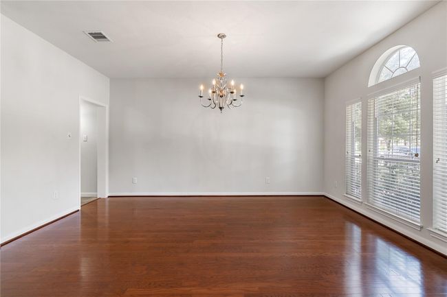 Alternative view of first floor formal dining without staging. | Image 36