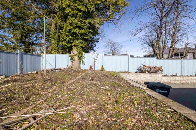 View of yard featuring a fenced backyard | Image 26