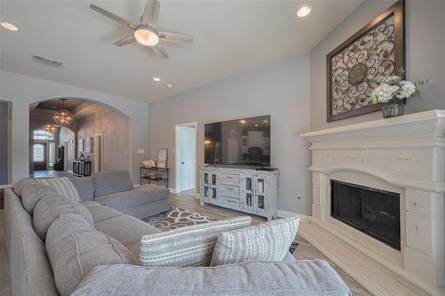 Good times and great conversations are sure to flow in this comfortable living area. | Image 15