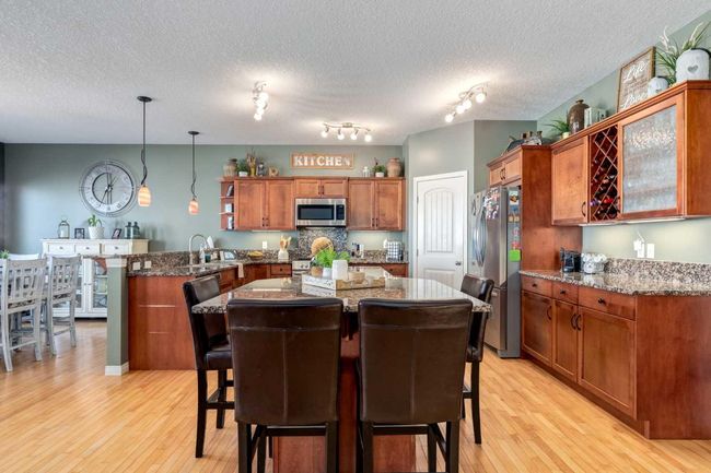 569 Boulder Creek Circle Se, House other with 4 bedrooms, 3 bathrooms and 6 parking in Langdon AB | Image 10