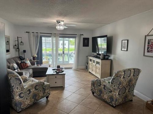 115-121 Wettaw Ln, North Palm Beach, FL, 33408-5706 | Card Image