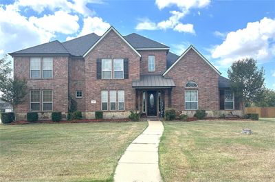 View of front of house with a front yard | Image 1