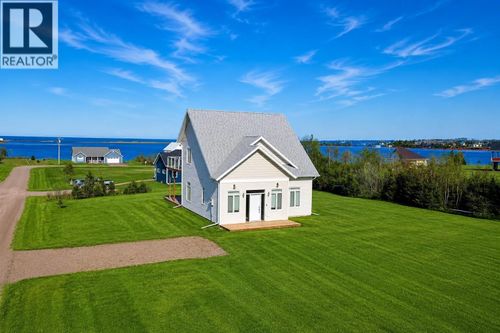 32 Blue Heron Cres, House with 4 bedrooms, 2 bathrooms and null parking in North Rustico PE | Card Image
