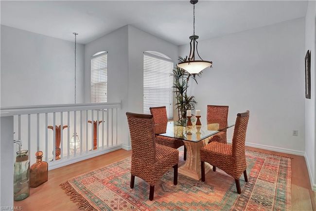 Dining area featuring hardwood / wood-style floors | Image 9