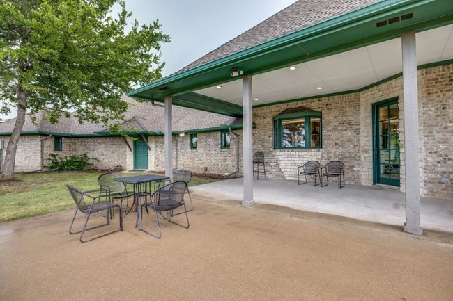 View of patio with outdoor dining space | Image 26