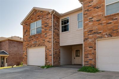 View of front of property featuring a garage | Image 3