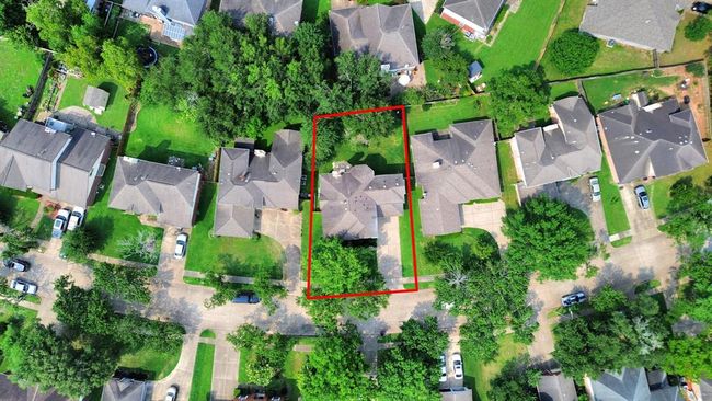 Aerial view of 235 Cedar Elm Ln—see the full picture of this beautiful home and its spacious surroundings. | Image 44