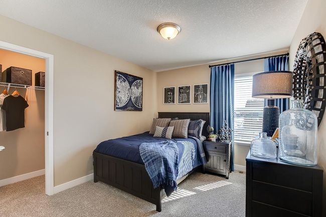 Space is also abundant throughout the rest of the home's upper level bedrooms. Model home photo, colors and selections may vary. | Image 12