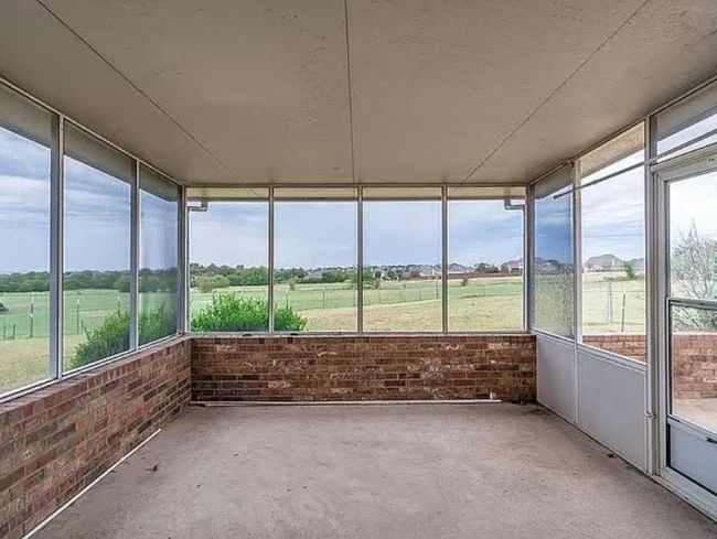 Unfurnished sunroom featuring a rural view | Image 6