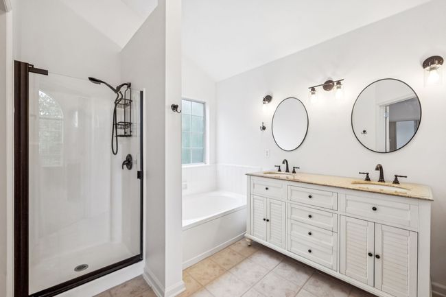 Primary Bathroom with Dual Vanities, Shower, and Soaking Tub | Image 36