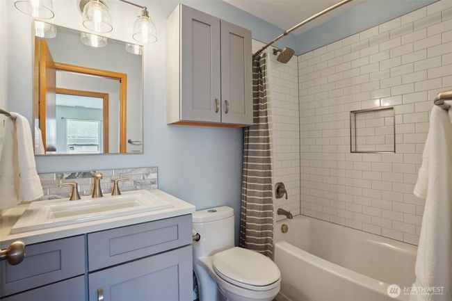 2nd full bathroom was just redone as well with new cabinets and a new surround | Image 22