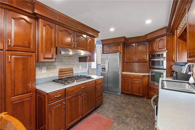 Gorgeous custom kitchen with cherry cabinetry | Image 4