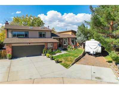 7551 S Garland St, House other with 4 bedrooms, 3 bathrooms and null parking in Littleton CO | Image 1