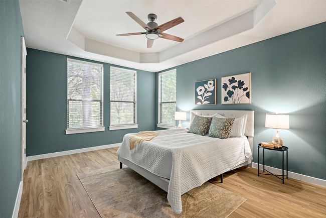 The primary suite on the main floor offers a peaceful retreat, tucked at the back of the home for ultimate privacy and quiet | Image 5