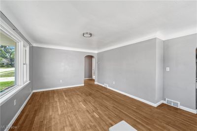 Spare room with hardwood / wood-style flooring | Image 3