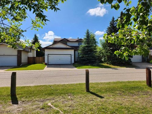 59 Woodmont Way Sw, Calgary, AB, T2W4L7 | Card Image