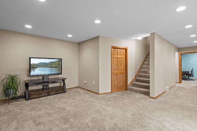 Easy access to storage area and utilities at bottom of the stairway | Image 28
