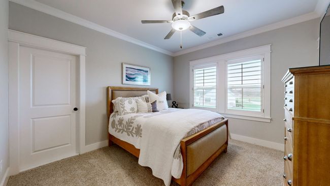 Upstairs bedroom with access to a Jack & Jill bath, offering dual vanities—perfect for privacy and daily convenience. | Image 45