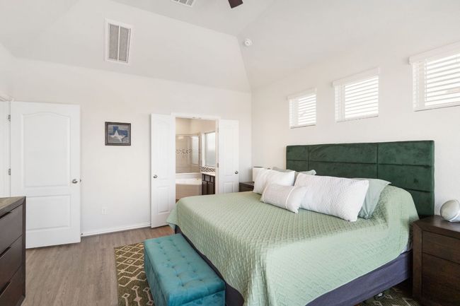 The primary bedroom is on the first/main floor, overlooking the backyard. | Image 13