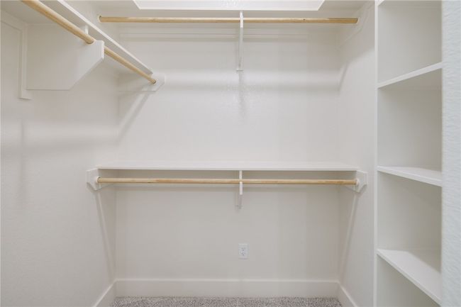 View of spacious closet | Image 25