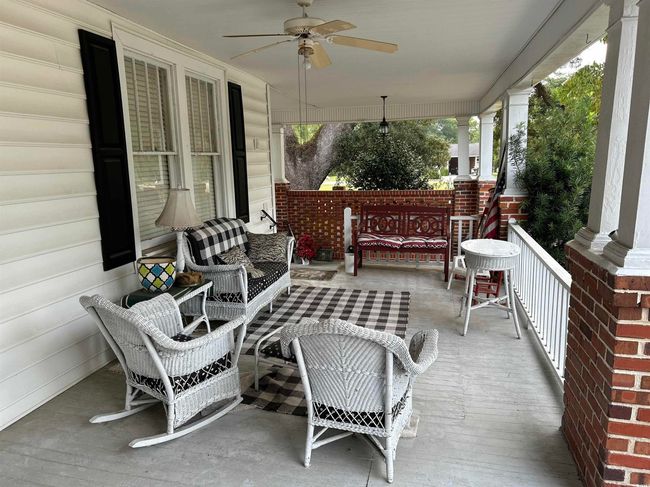 View of patio featuring ceiling fan and covered porch | Image 8