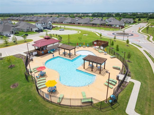 Community pool with a residential view and a gazebo | Image 34