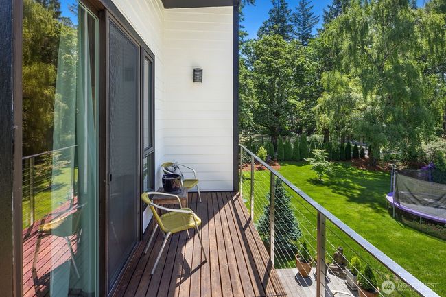 Just imagine sipping morning coffee from your private deck, surrounded by woods and your verdant grounds. | Image 16