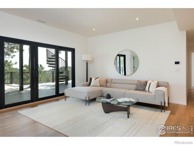 Lower level living space with outdoor access and privacy for guests | Image 29