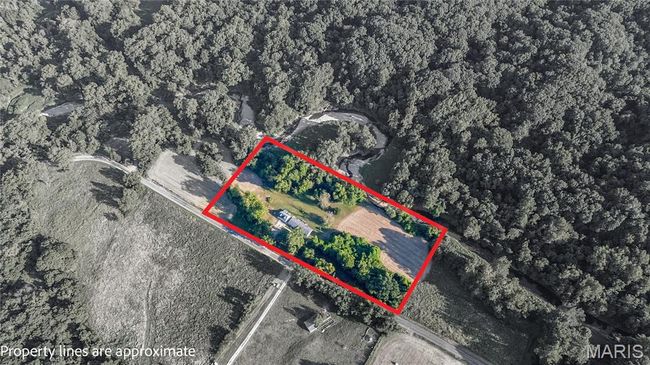 Aerial view of property's location featuring property parcel outlined | Image 40