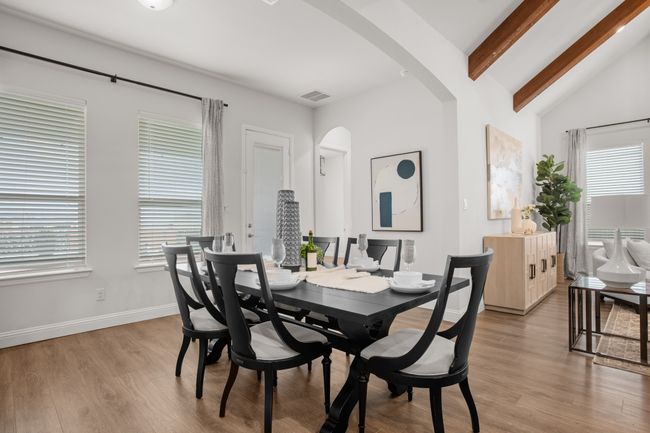 Just off the dining space is the patio door - to the large covered patio with a view of the pool | Image 21