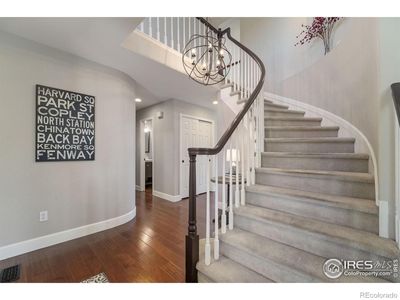 Walk in and enjoy the beautiful engineered hardwood flooring on the main level. | Image 3