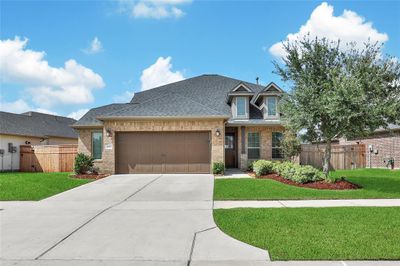 Welcome to 5923 Pedernales Bend Ln! This 2 BR/2BA home is located in the gated section of Bonterra @ Cross Creek Ranch. An extended 2 Car Garage with an epoxy floor provides room for autos & storage. | Image 1