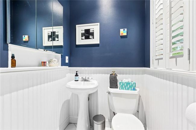 the main level powder room | Image 12